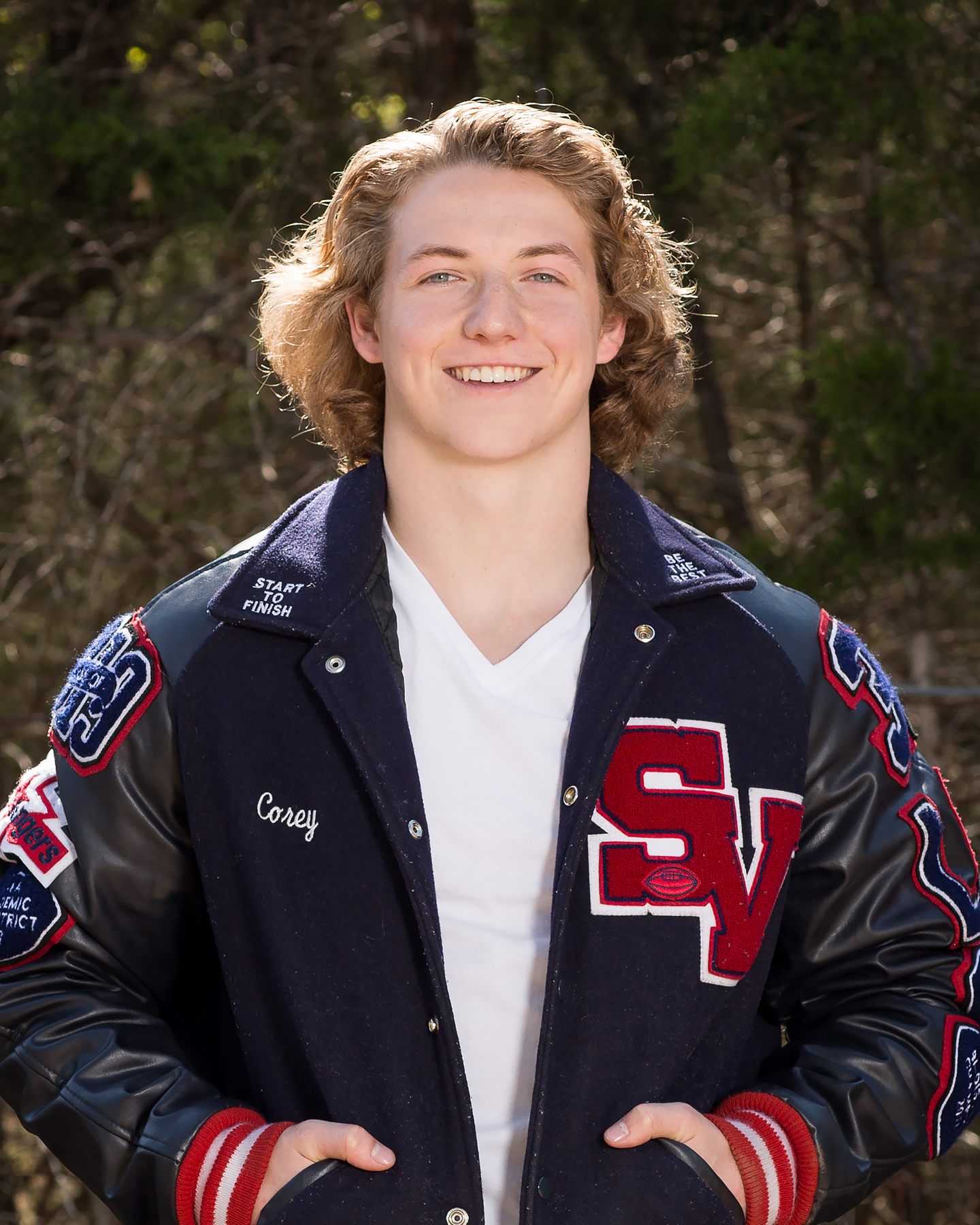 Senior portrait photographed by Frame Photography